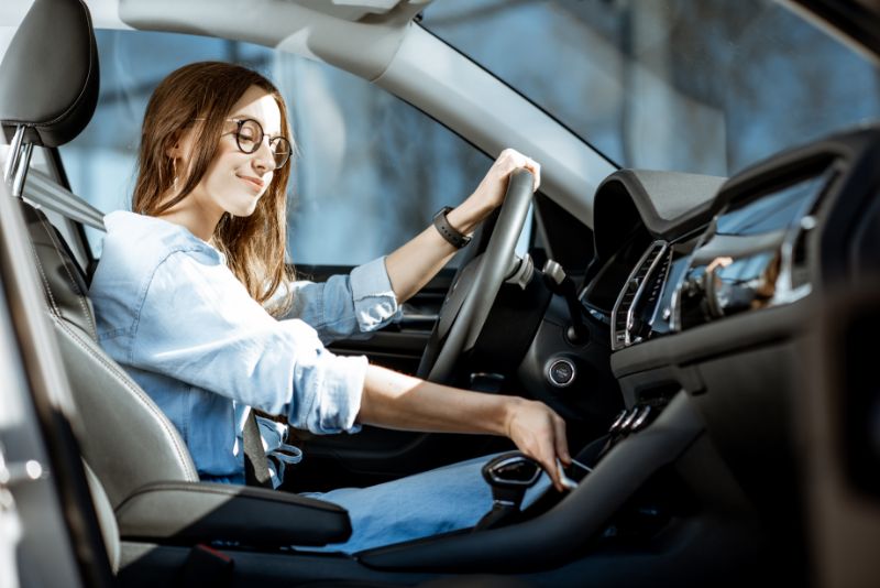 A woman driving a car